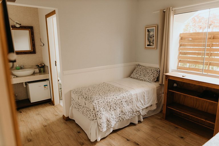 Suíte em pousada de charme em Jurerê