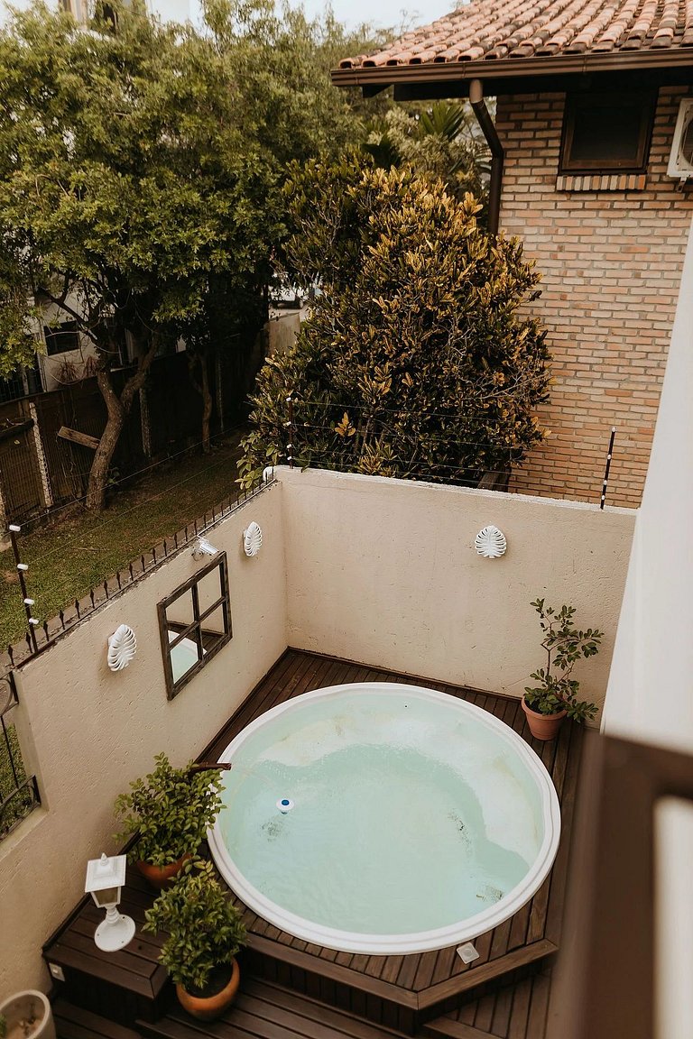 Suíte em pousada de charme em Jurerê