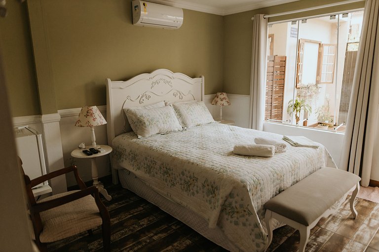 Suíte em pousada de charme em Jurerê