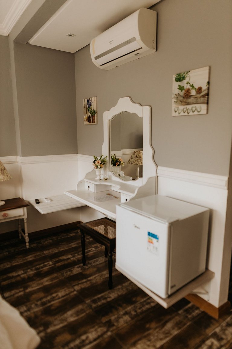 Suíte em pousada de charme em Jurerê