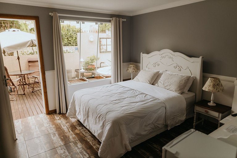 Suíte em pousada de charme em Jurerê