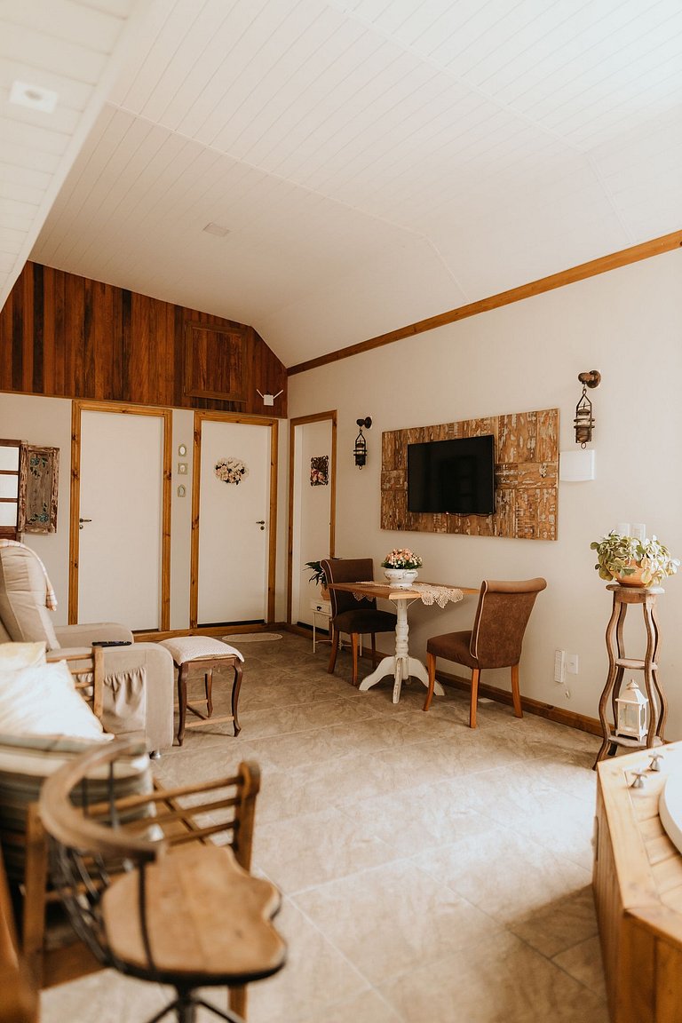 Suíte em pousada de charme em Jurerê