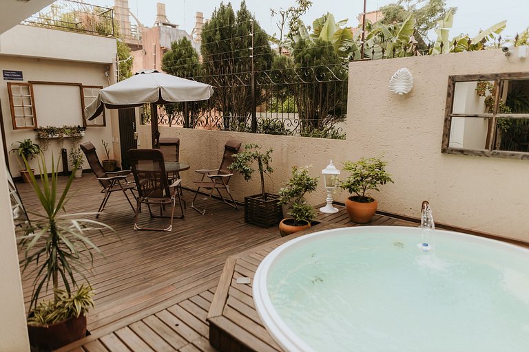 Suíte em pousada de charme em Jurerê