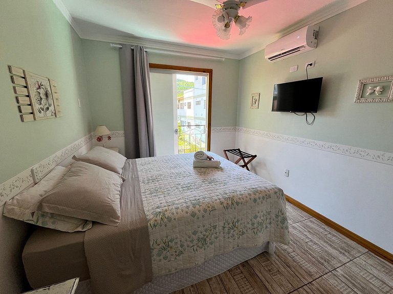 Suíte em pousada de charme em Jurerê