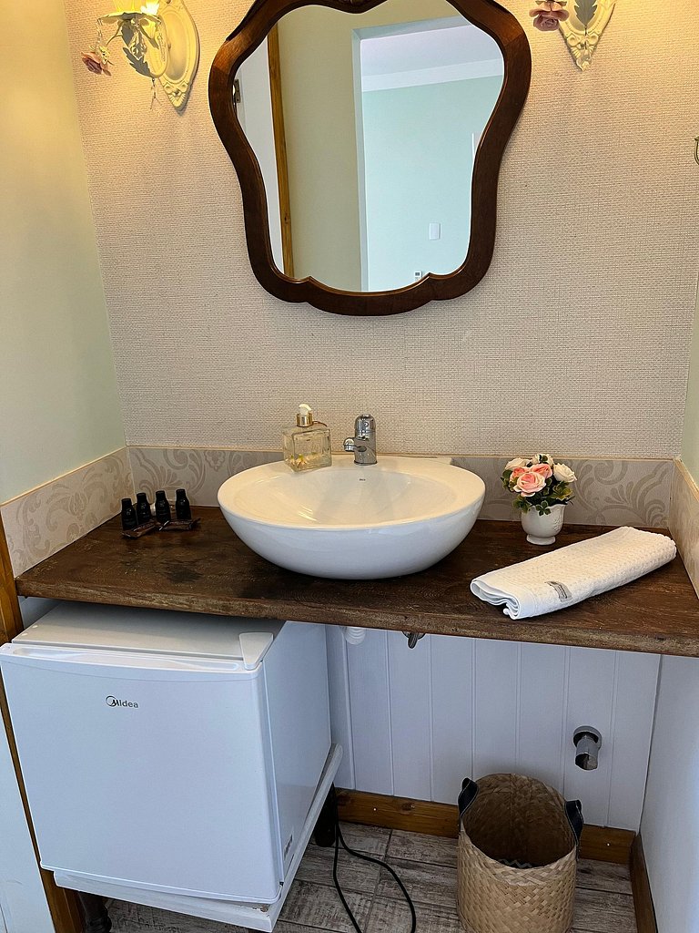 Suíte em pousada de charme em Jurerê