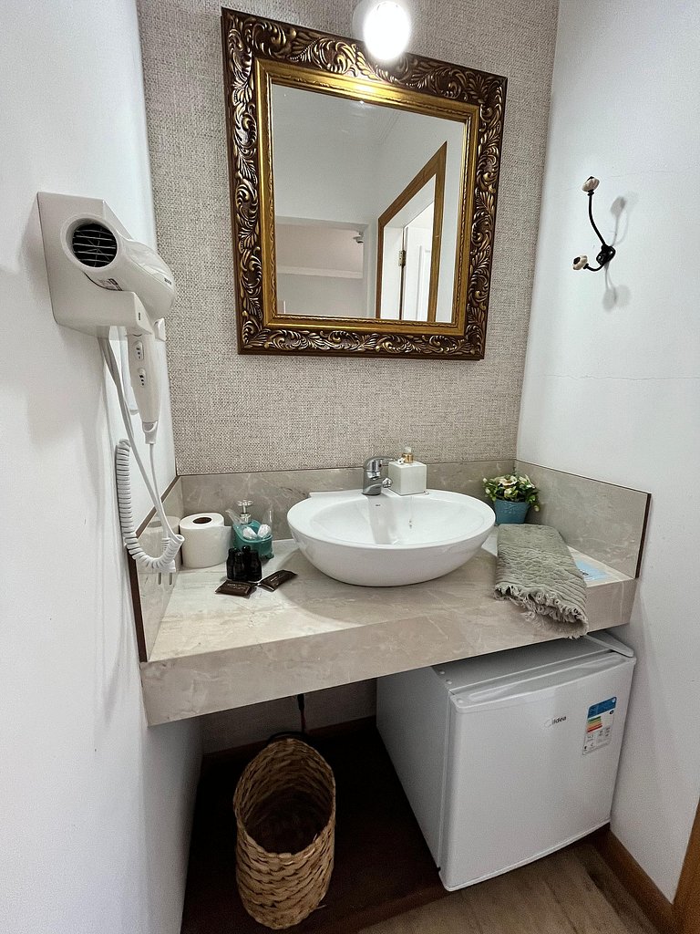 Suíte em pousada de charme em Jurerê