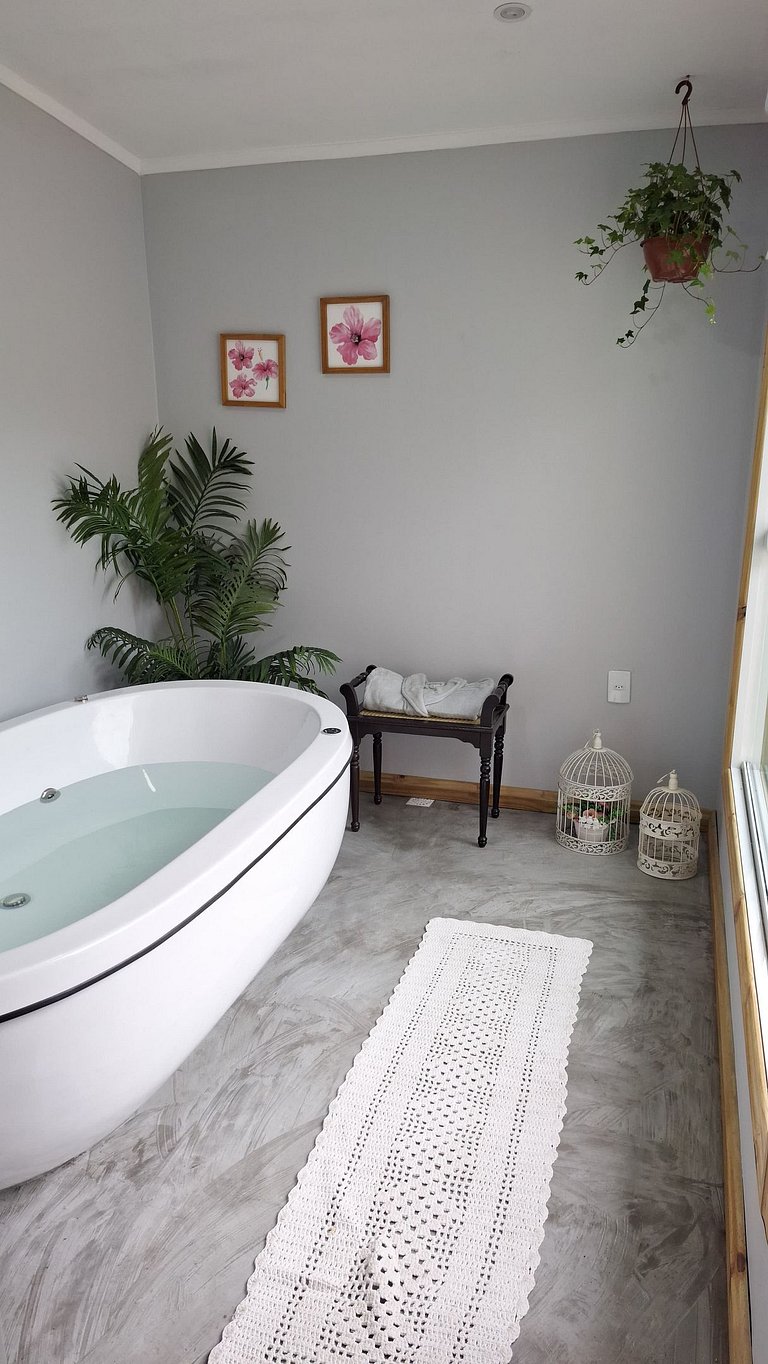 Suíte em pousada de charme em Jurerê