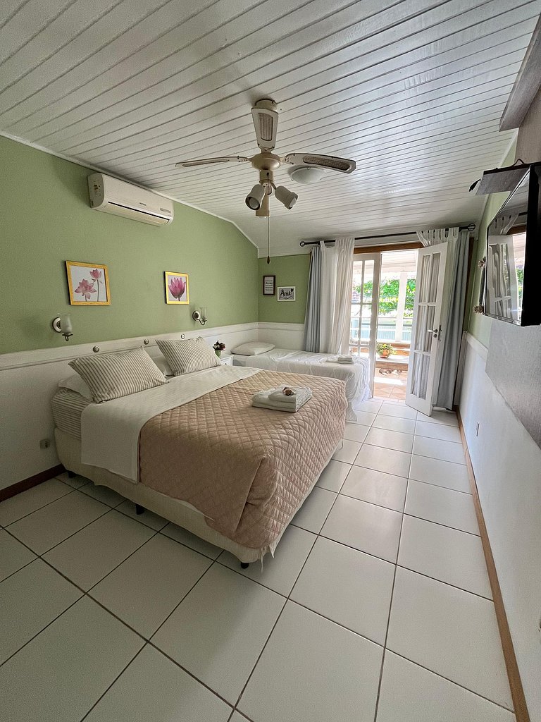 Suíte em pousada de charme em Jurerê