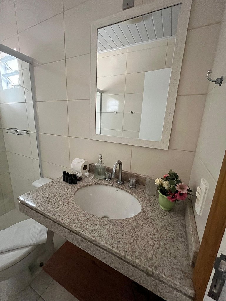 Suíte em pousada de charme em Jurerê