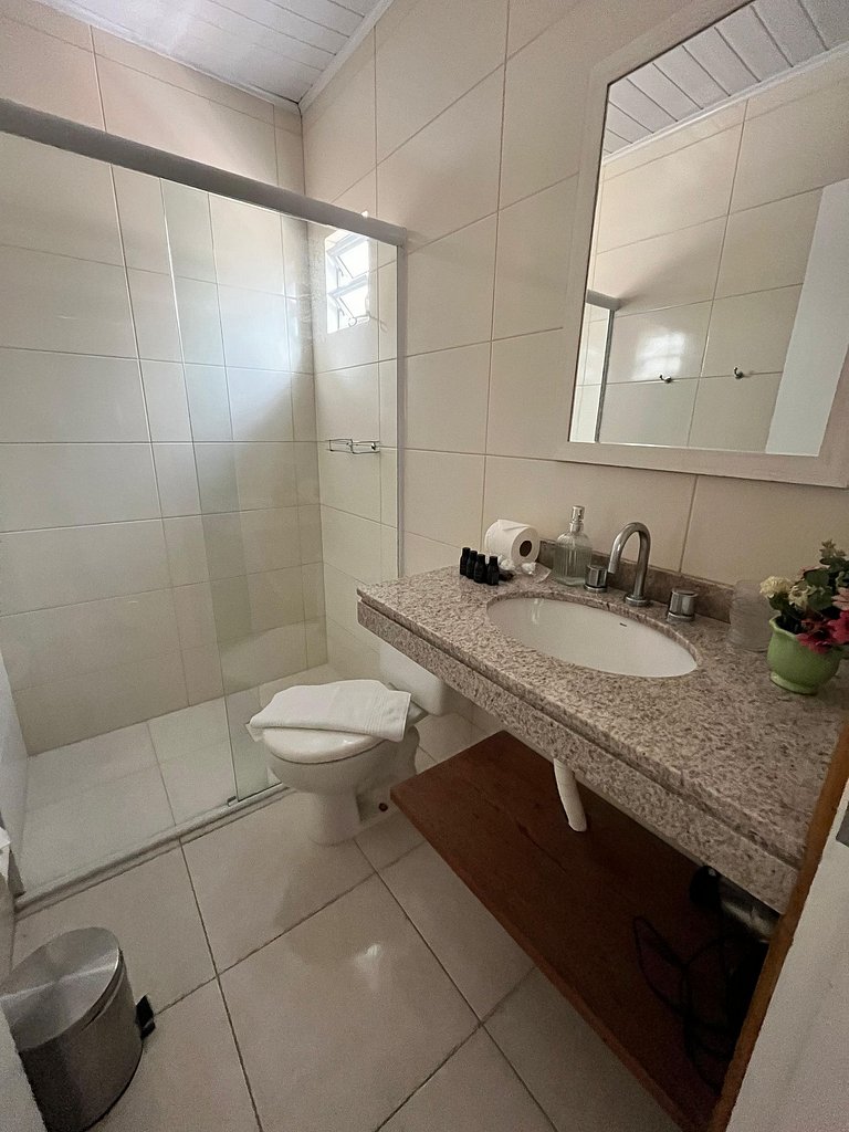 Suíte em pousada de charme em Jurerê