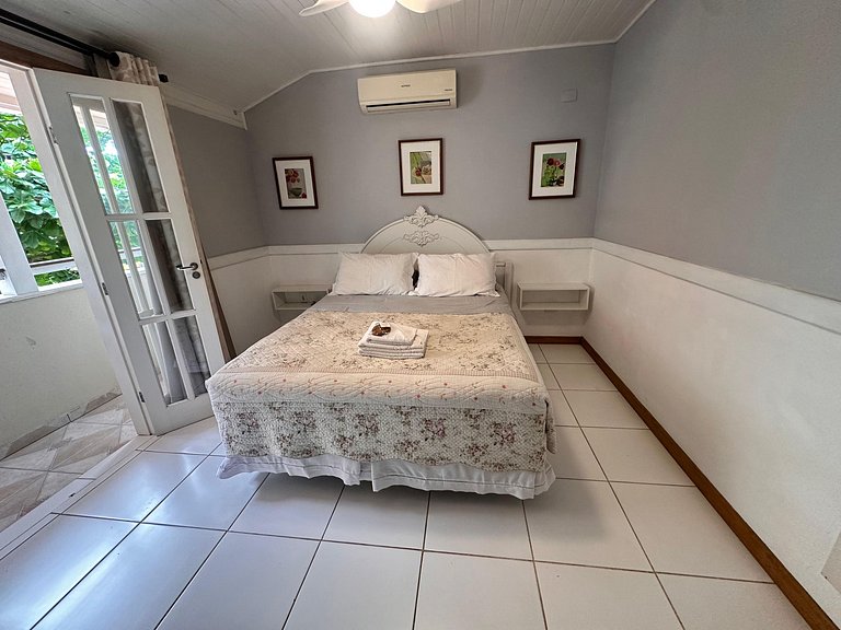 Suíte em pousada de charme em Jurerê