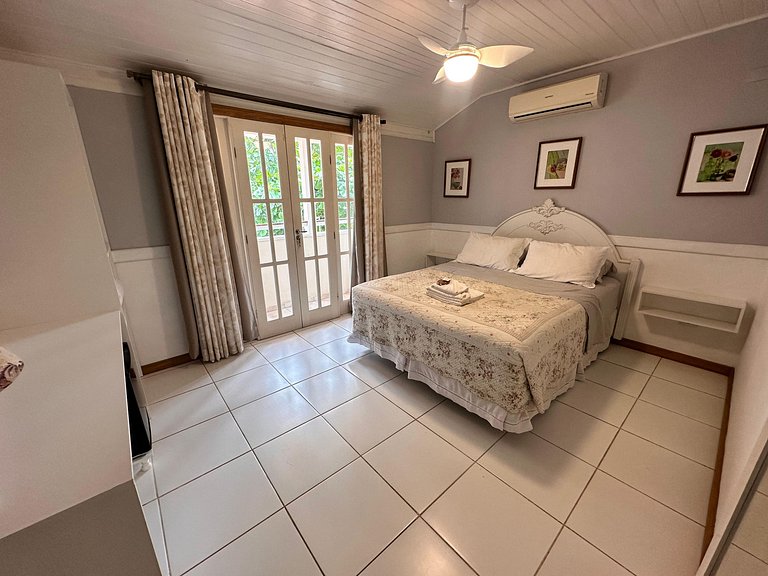 Suíte em pousada de charme em Jurerê