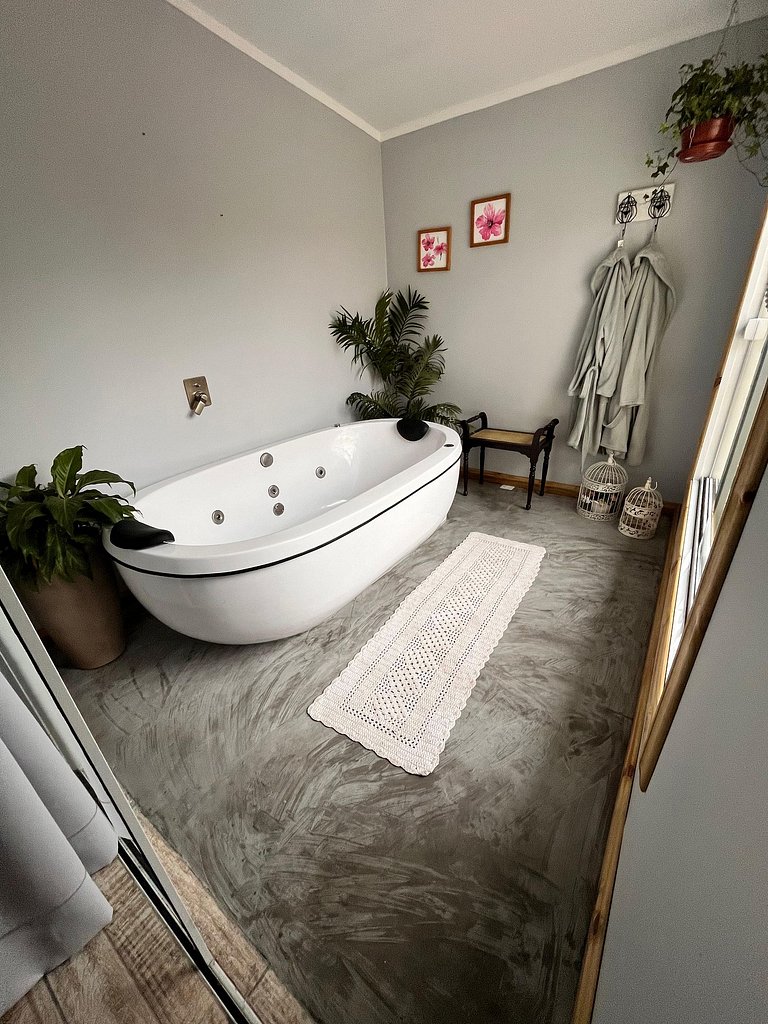 Suíte em pousada de charme em Jurerê