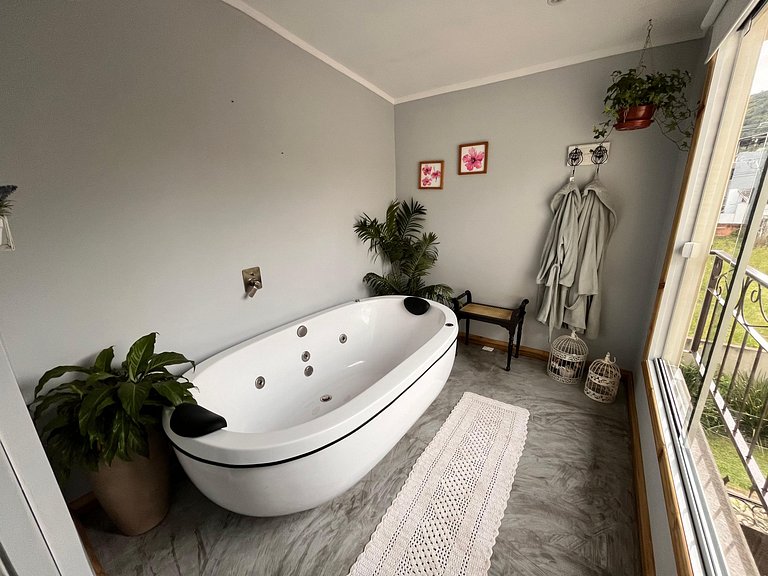 Suíte em pousada de charme em Jurerê