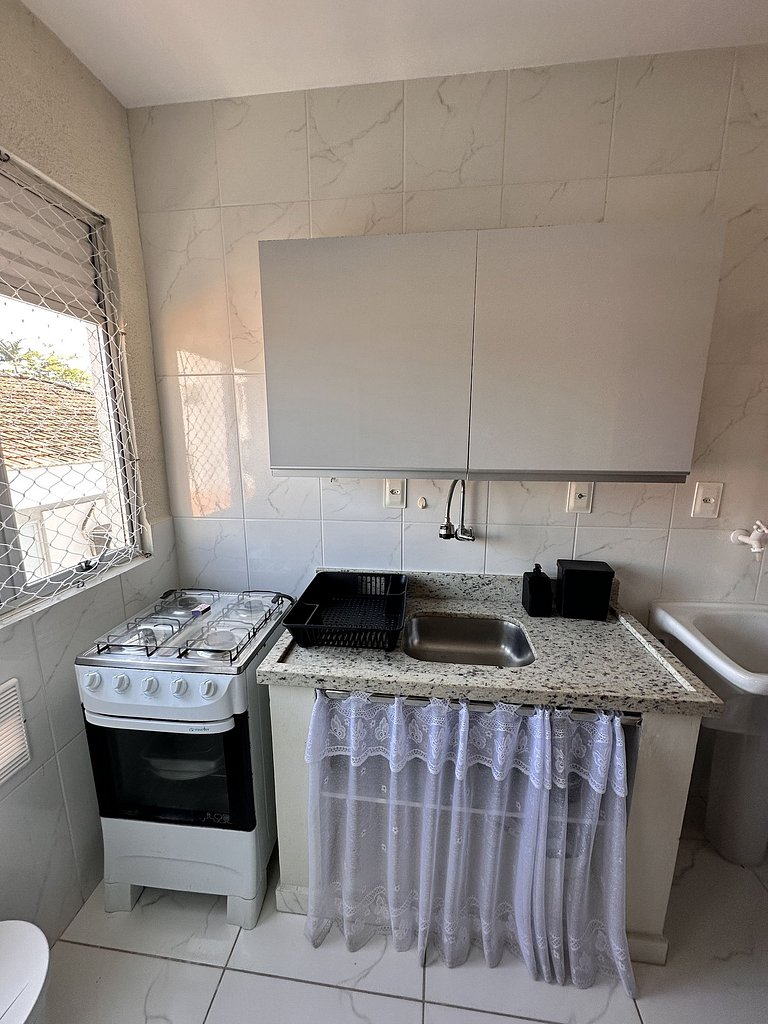 Condomínio próximo mar, balcón e Parrilla