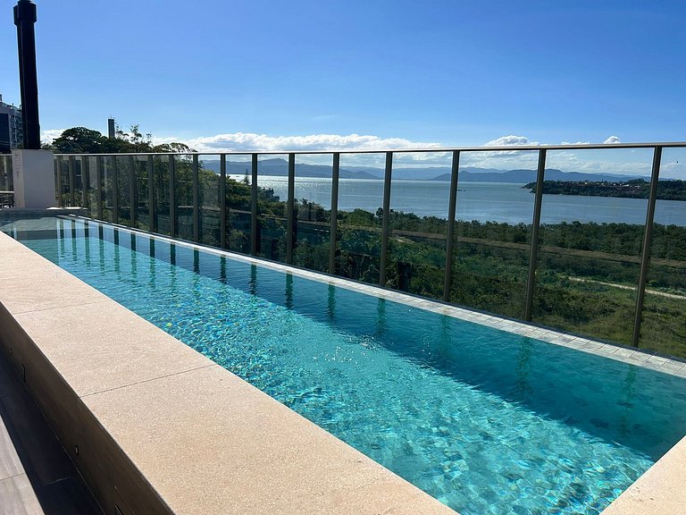 Vista incrível + piscina borda infinita | 2 suítes