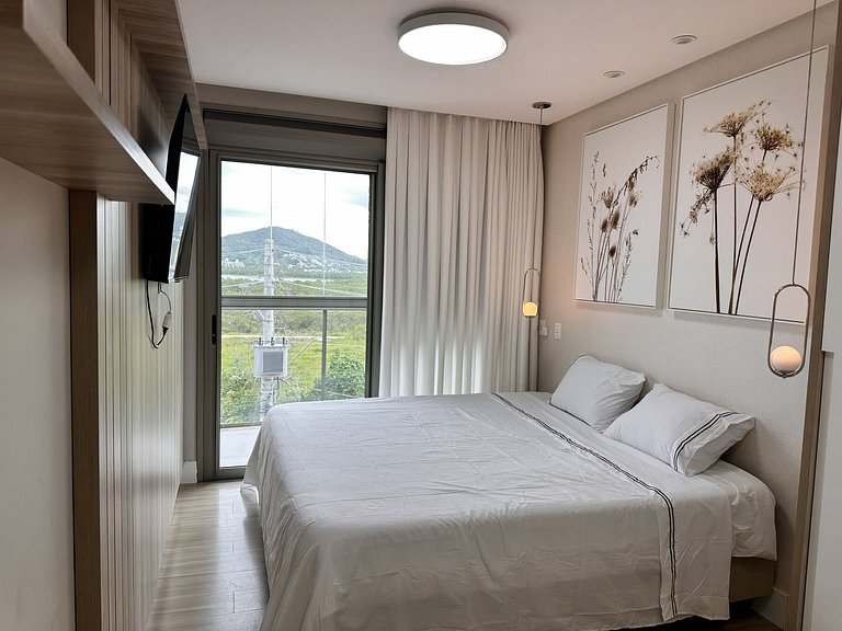 Vista incrível + piscina borda infinita | 2 suítes