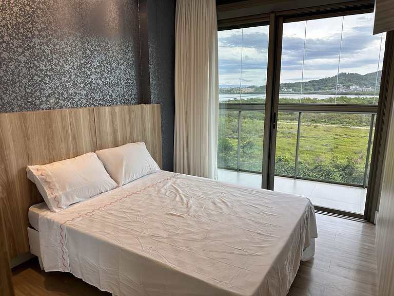 Vista incrível + piscina borda infinita | 2 suítes