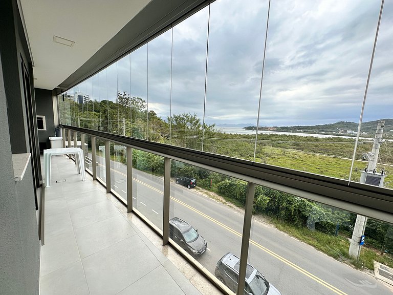 Vista incrível + piscina borda infinita | 2 suítes