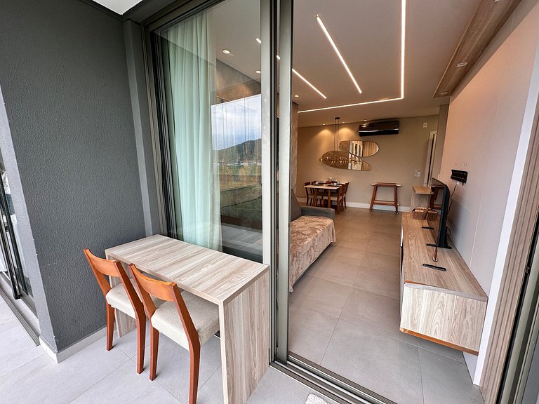 Vista incrível + piscina borda infinita | 2 suítes